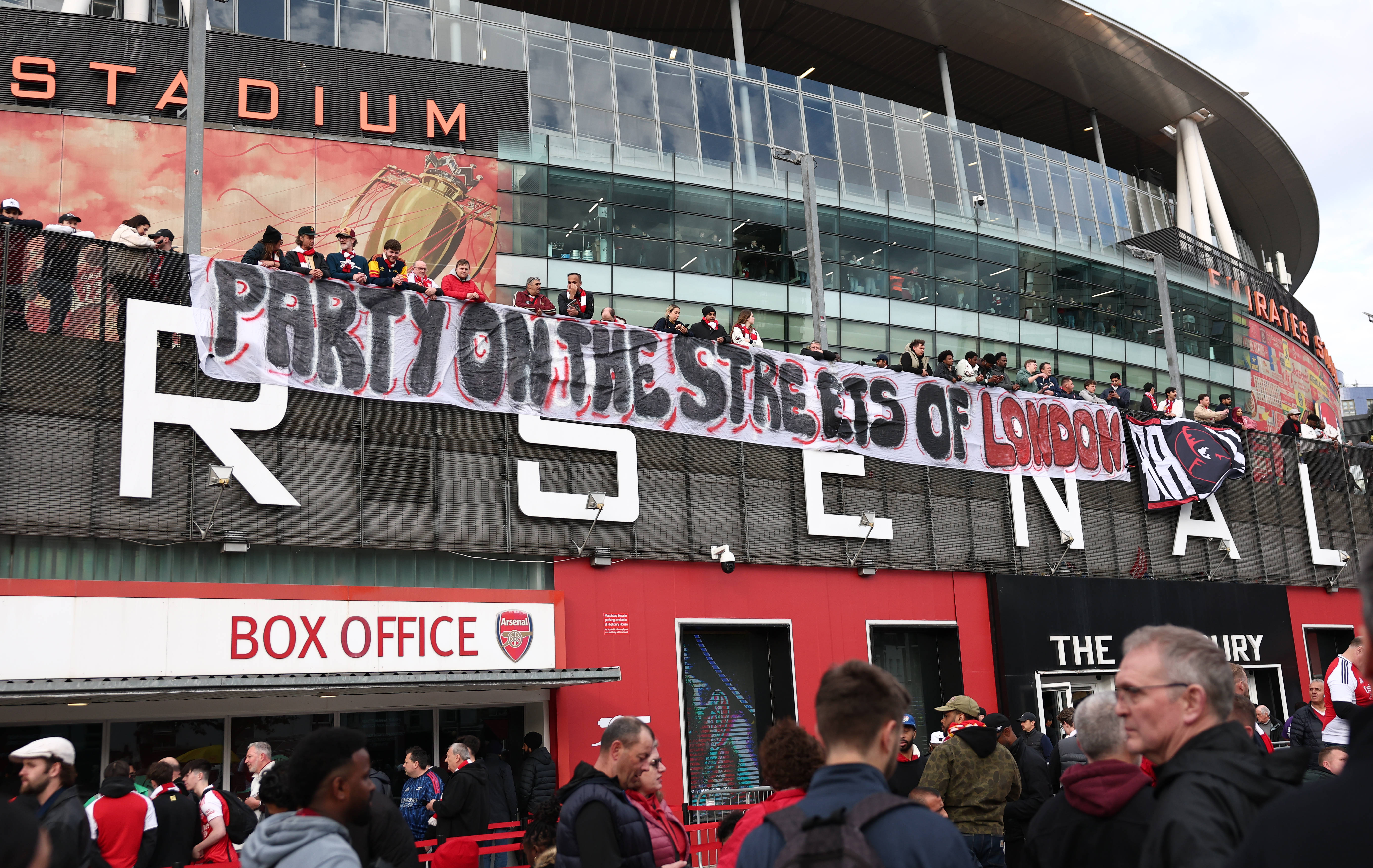 Wild scenes at Emirates Stadium as Arsenal fans celebrate Premier League title through the night