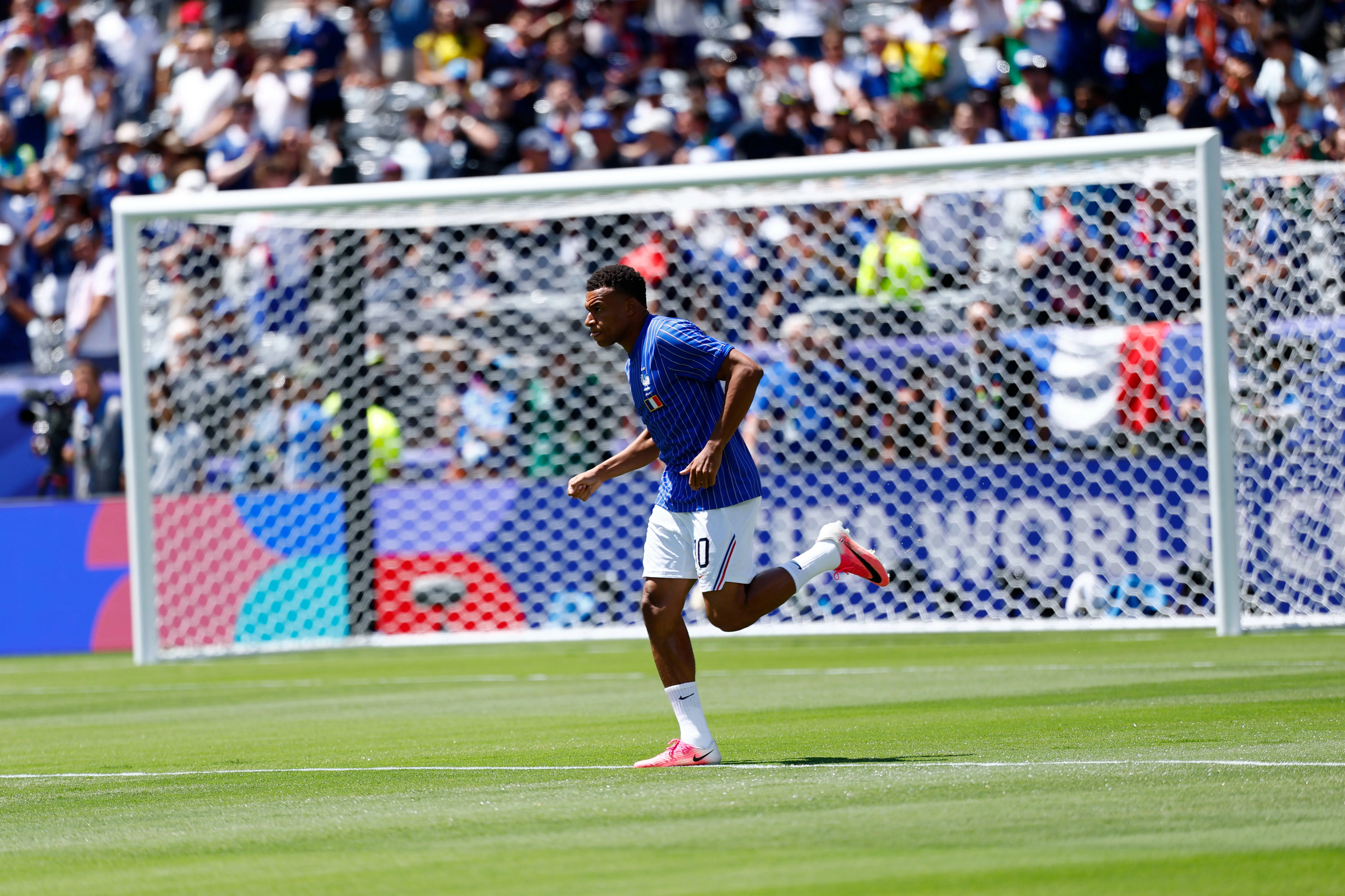 Kylian Mbappe of France running onto pitch at New York New Jersey Stadium 