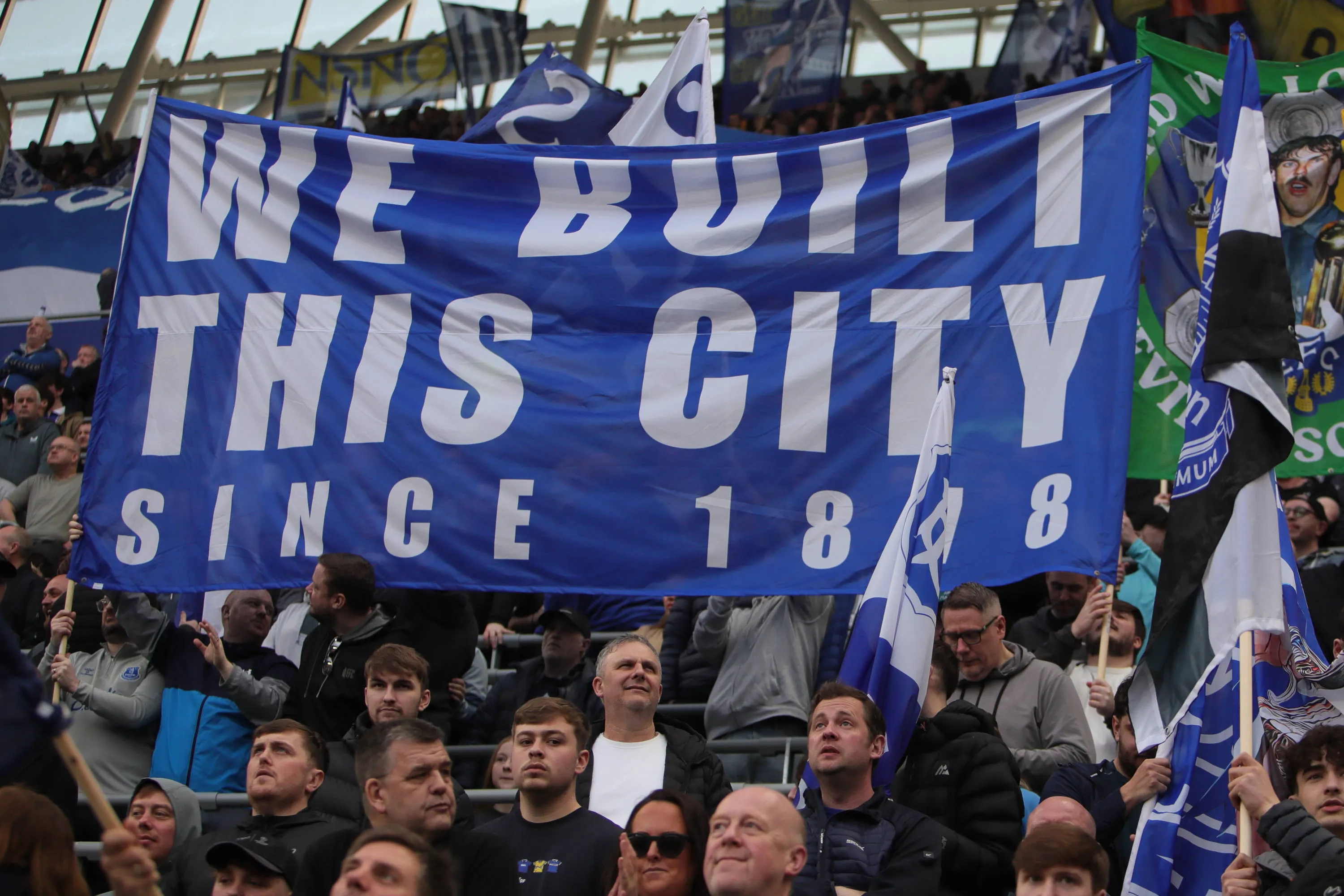 Everton fans waving banners vs Chelsea at Hill Dickinson Stadium