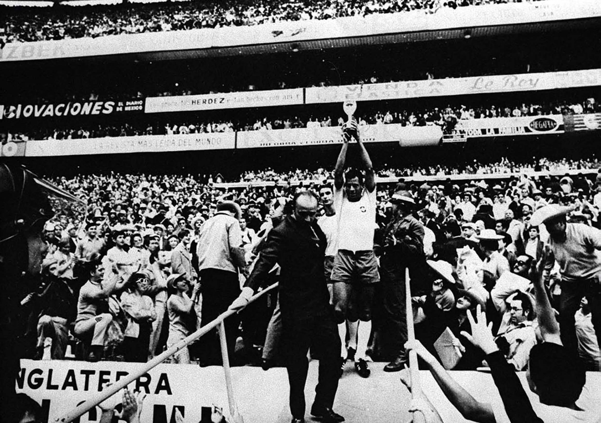 Brazil captain Carlos Alberto lifts the World Cup after a 4-1 victory over Italy at Estadio Azteca