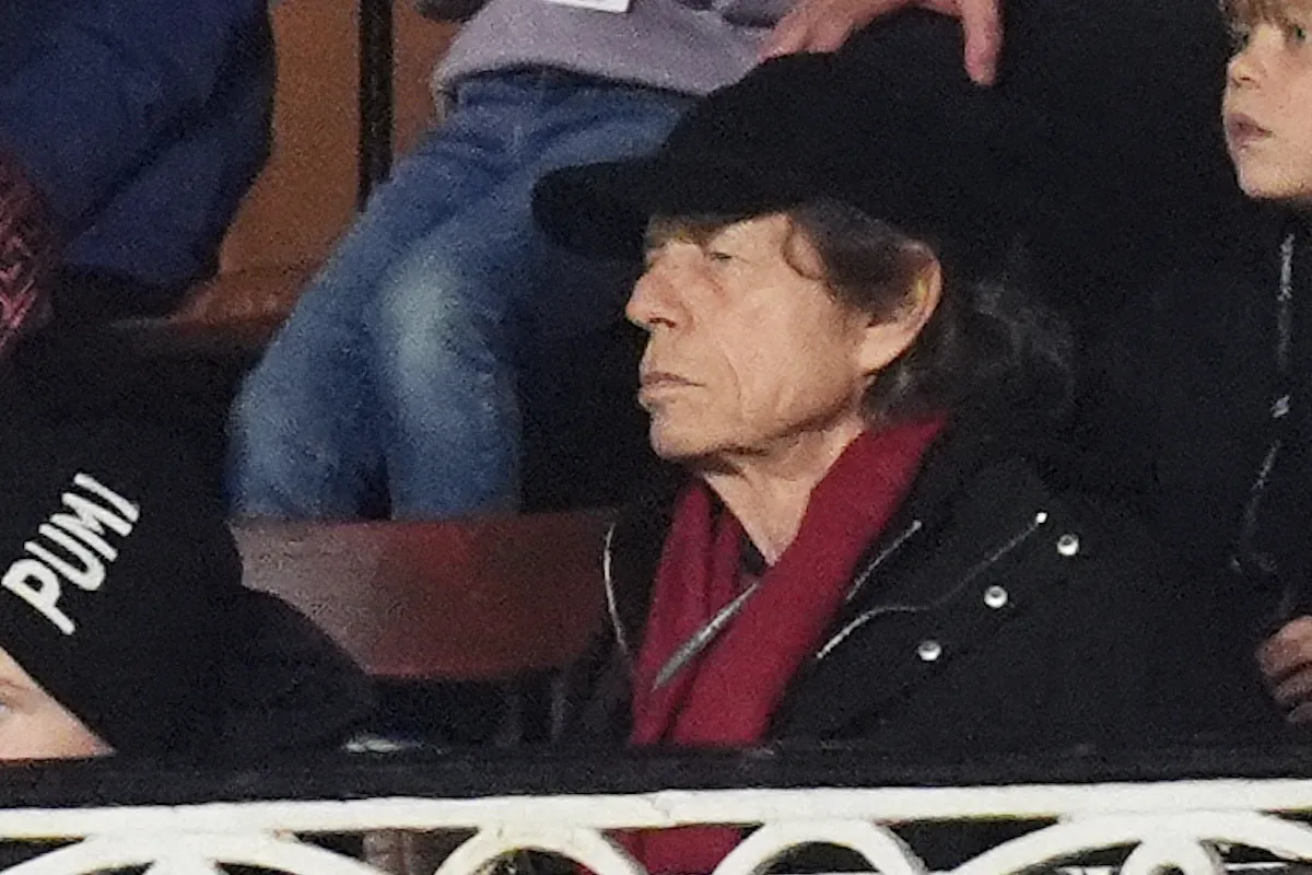 Arsenal fan Mick Jagger watches on from the stands during the Premier League match at Craven Cottage on October 18, 2025.