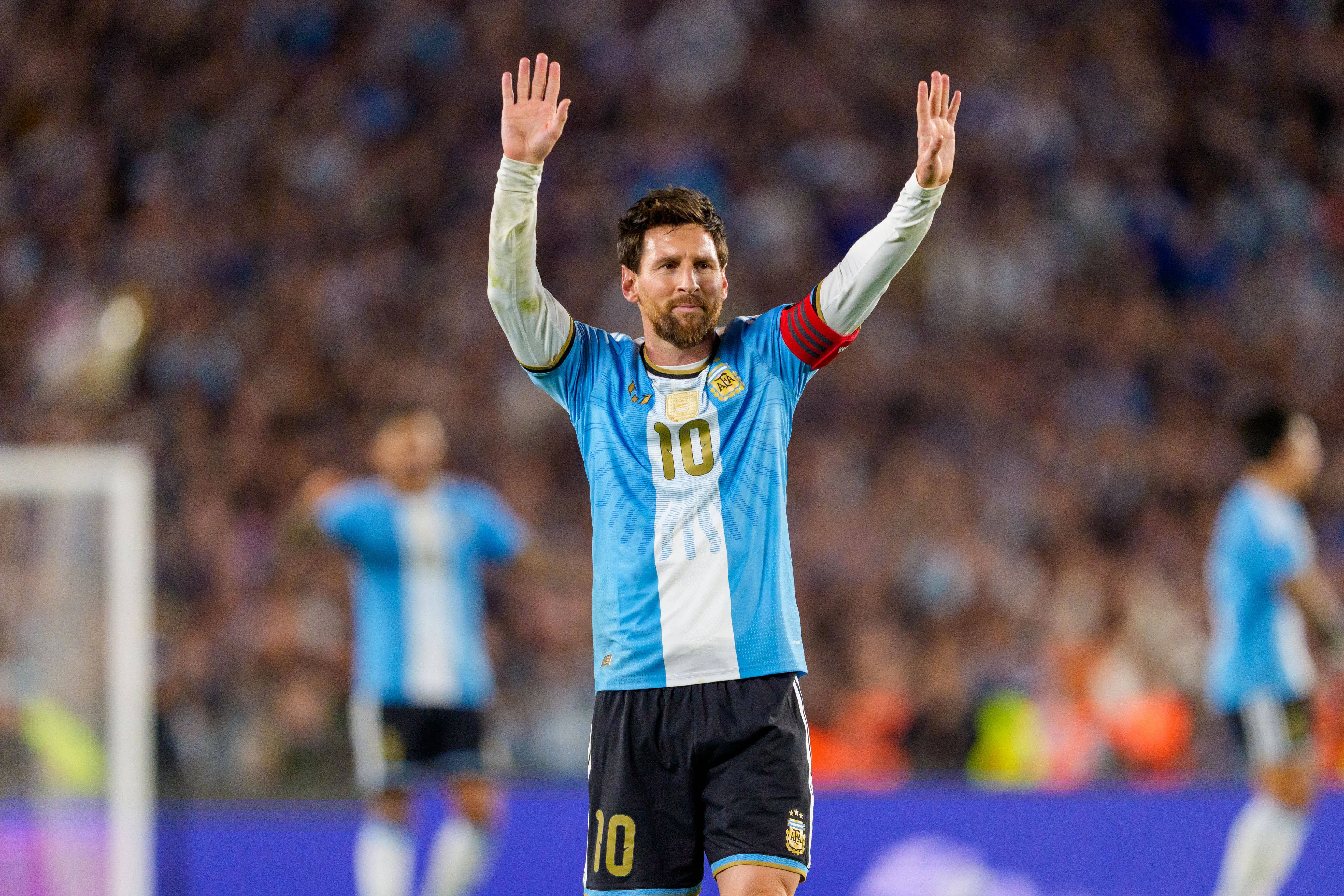 Lionel Messi celebrates scoring a goal vs Benin at Estadio Monumental