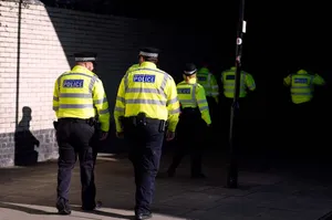 Police raid stadium to arrest Premier League pair over rape