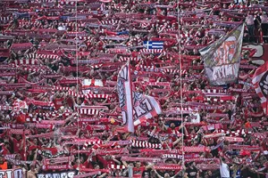 Olympiacos fans show their respect to travelling Aston Villa supporters