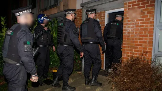 Greater Manchester police arrest Man U fans in dawn raids