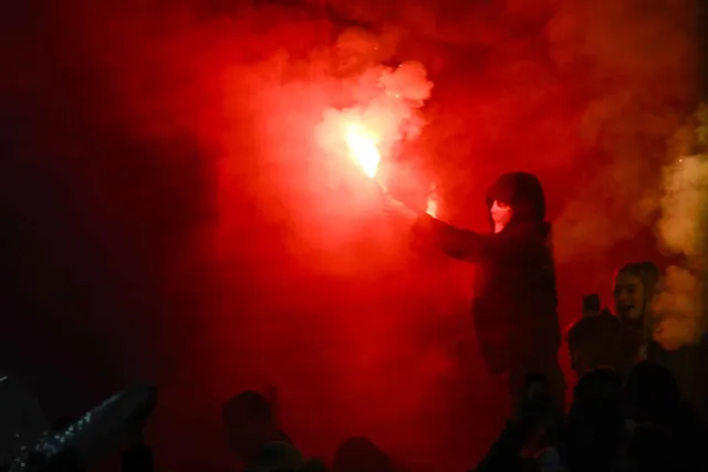 Anderlecht's hooligans use fireworks during a soccer match between RSC Anderlecht and KRC Genk