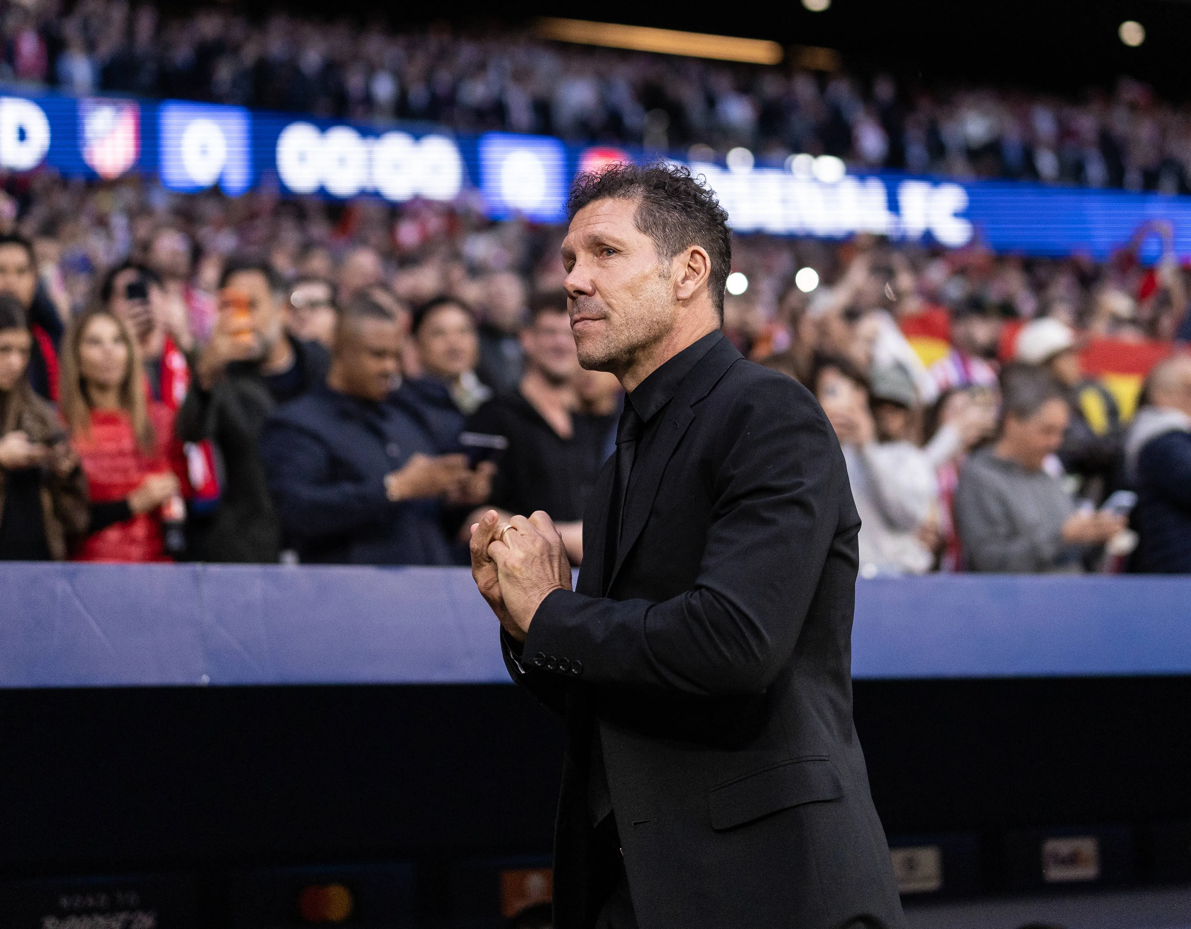Diego Simeone looks on before Atletico vs Arsenal semi-final first leg