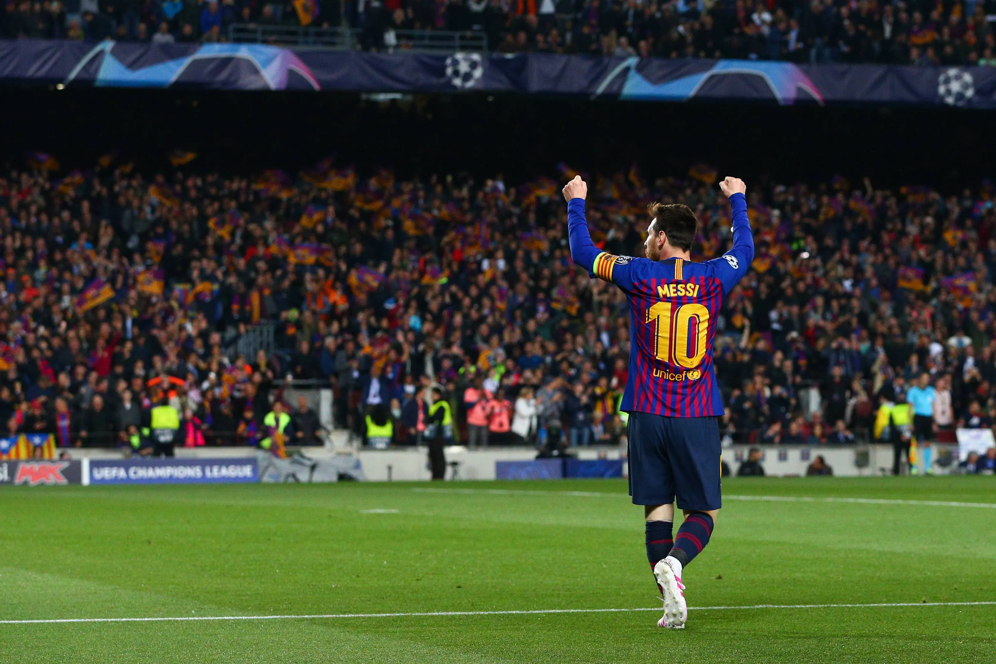 Lionel Messi celebrates scoring for Barcelona at Camp Nou