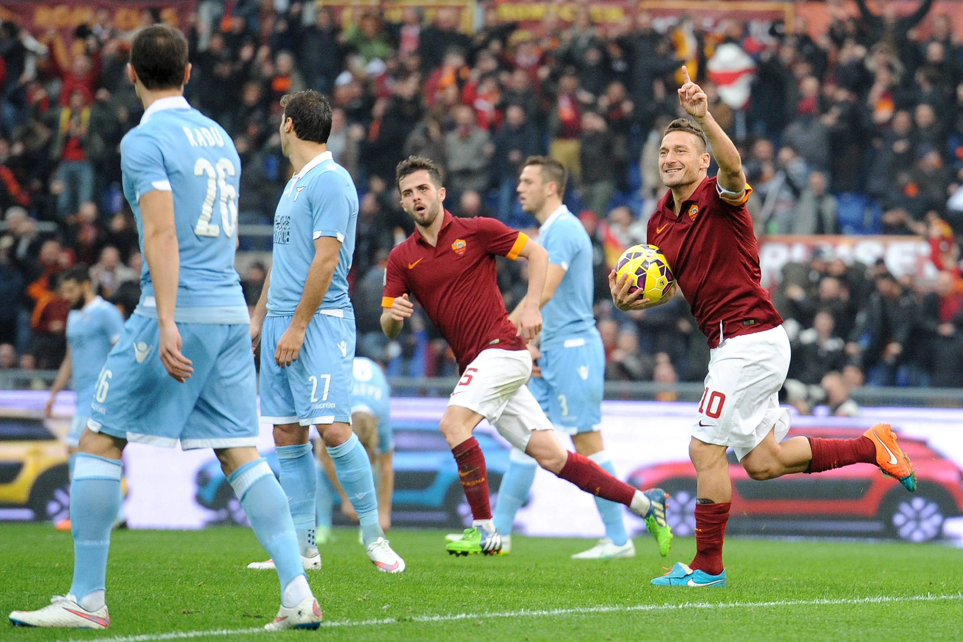 Roma legend Francesco Totti celebrates scoring vs Lazio