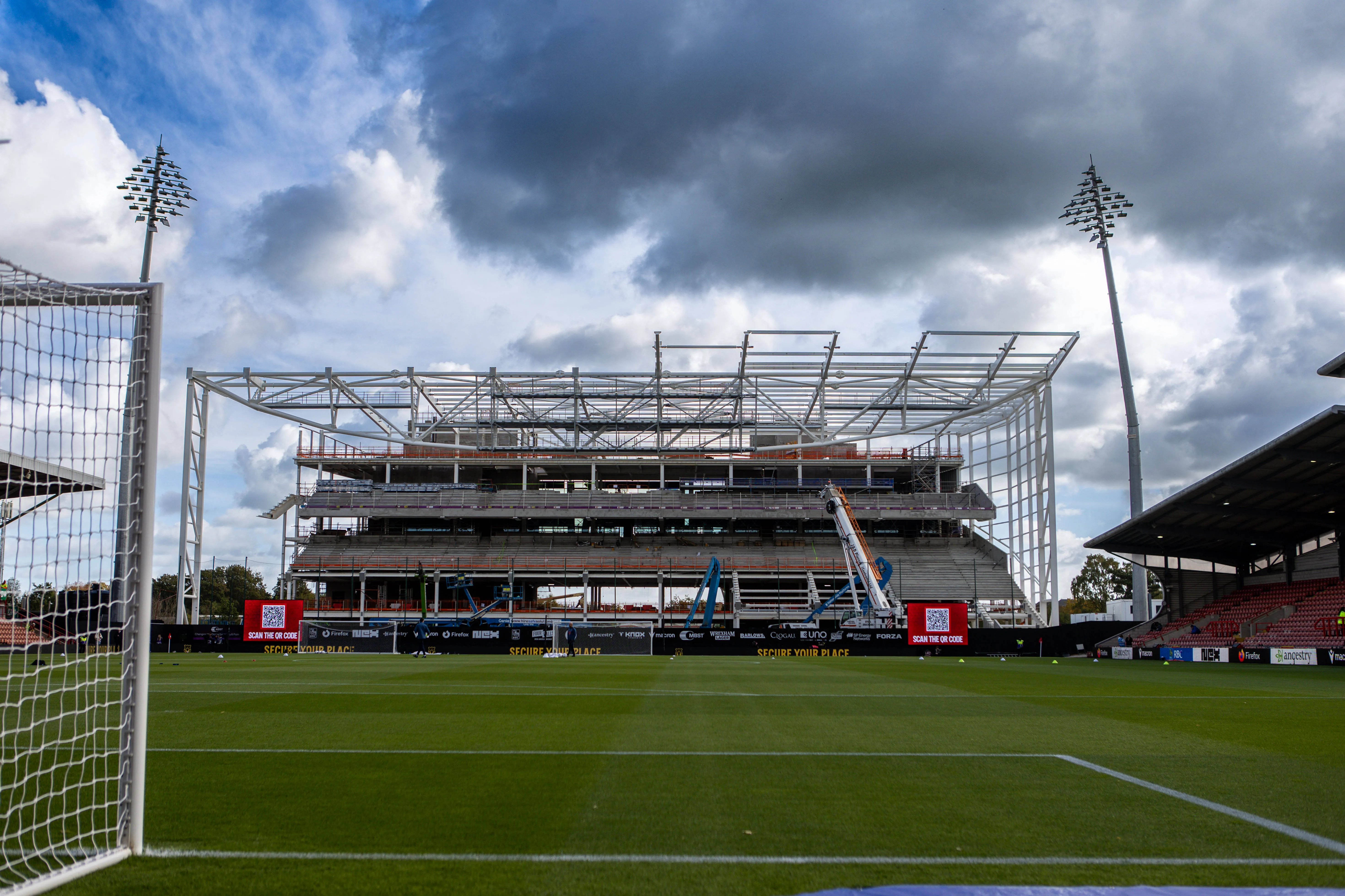 Latest Wrexham Kop Stand footage shows facade and roof progress amid challenging weather conditions