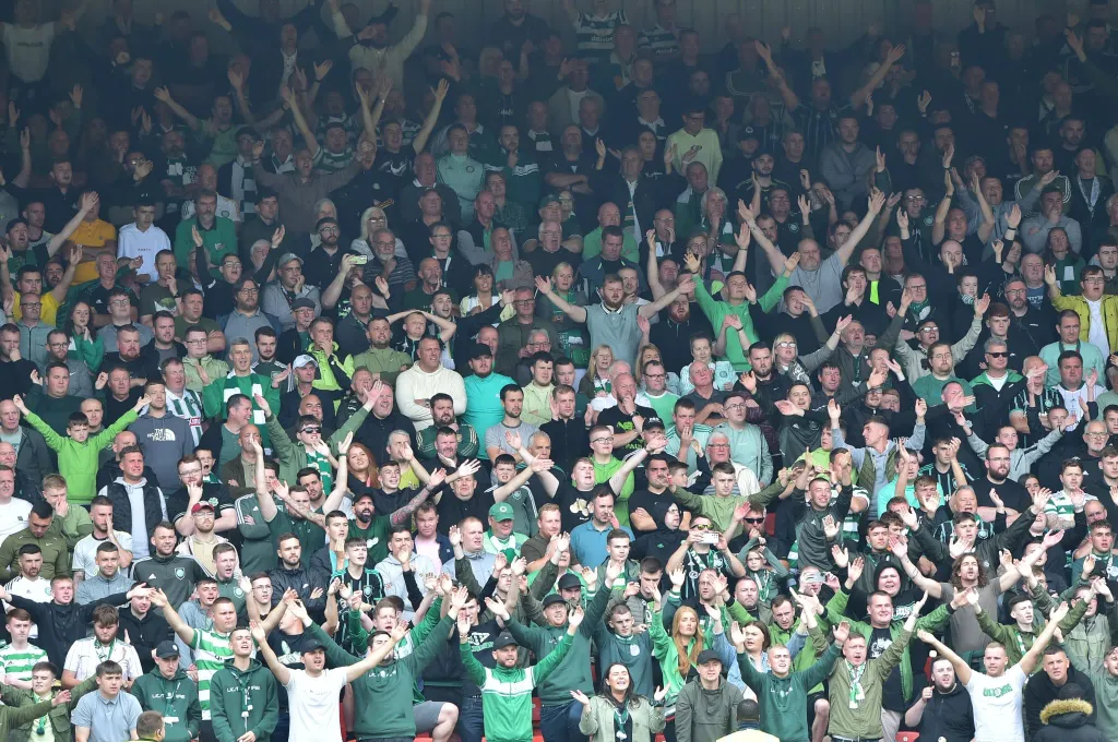 Celtic fans stood in an away end