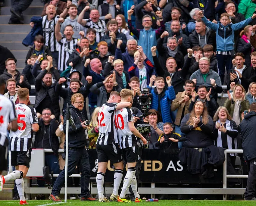 Newcastle United fans celebrate a goal against Tottenham