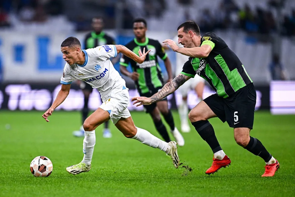 Lewis Dunk of Brighton & Hove Albion in the UEFA Europa League in Marseille | Brighton owner Tony Bloom saved Brighton fans on a delayed lfight and referenced Dunk