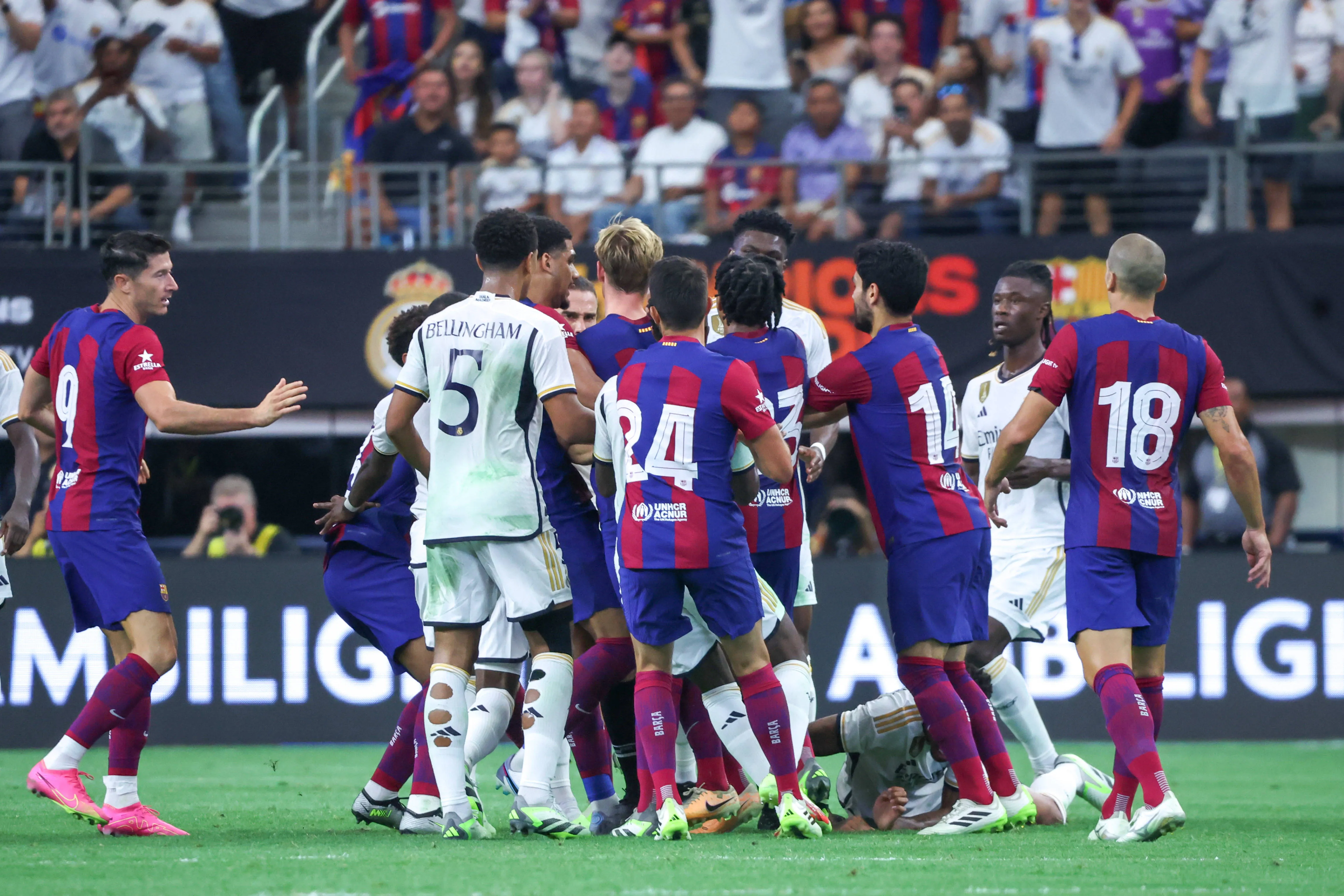 Barcelona and Real Madrid players clash during feisty El Clasico at AT&T Stadium