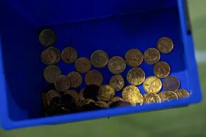 Why did fans throw chocolate coins on the pitch during Koln vs Borussia Dortmund?