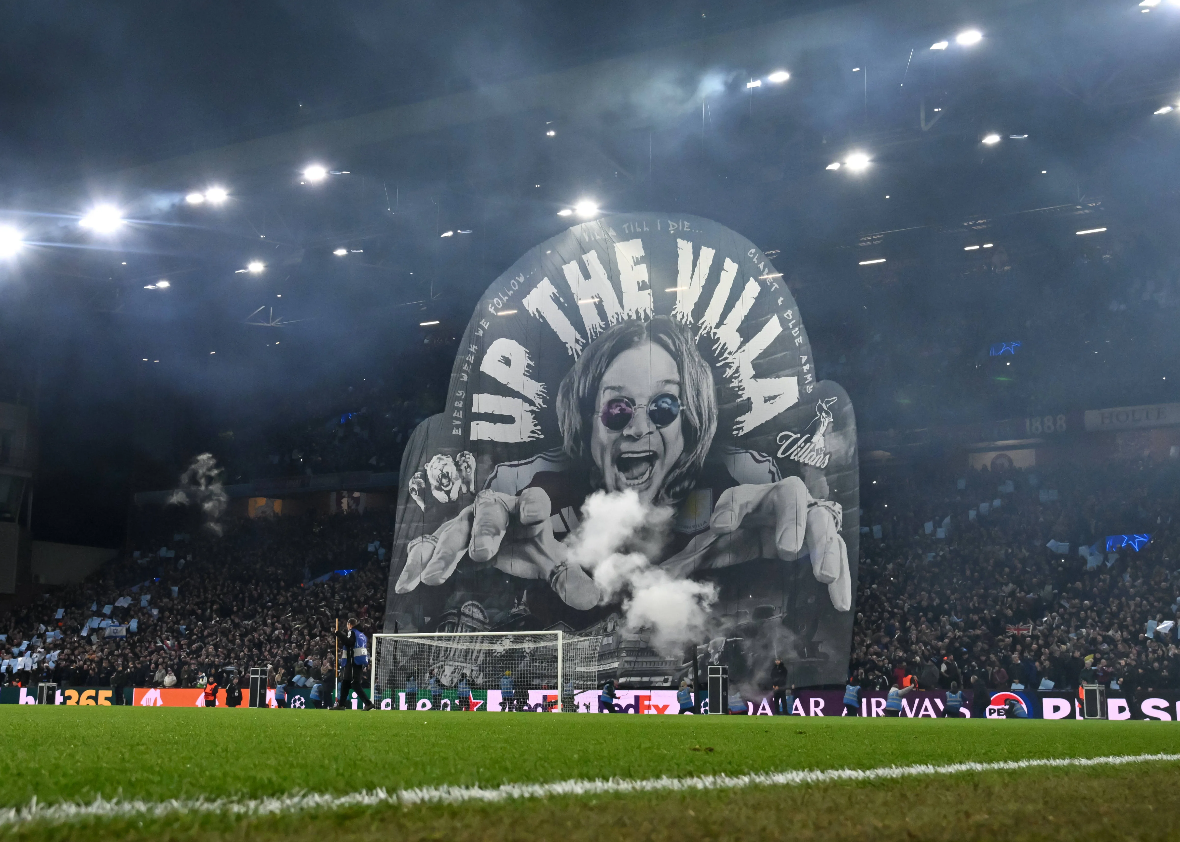 A tifo is displayed showing an image of Ozzy Osbourne at Villa Park 
