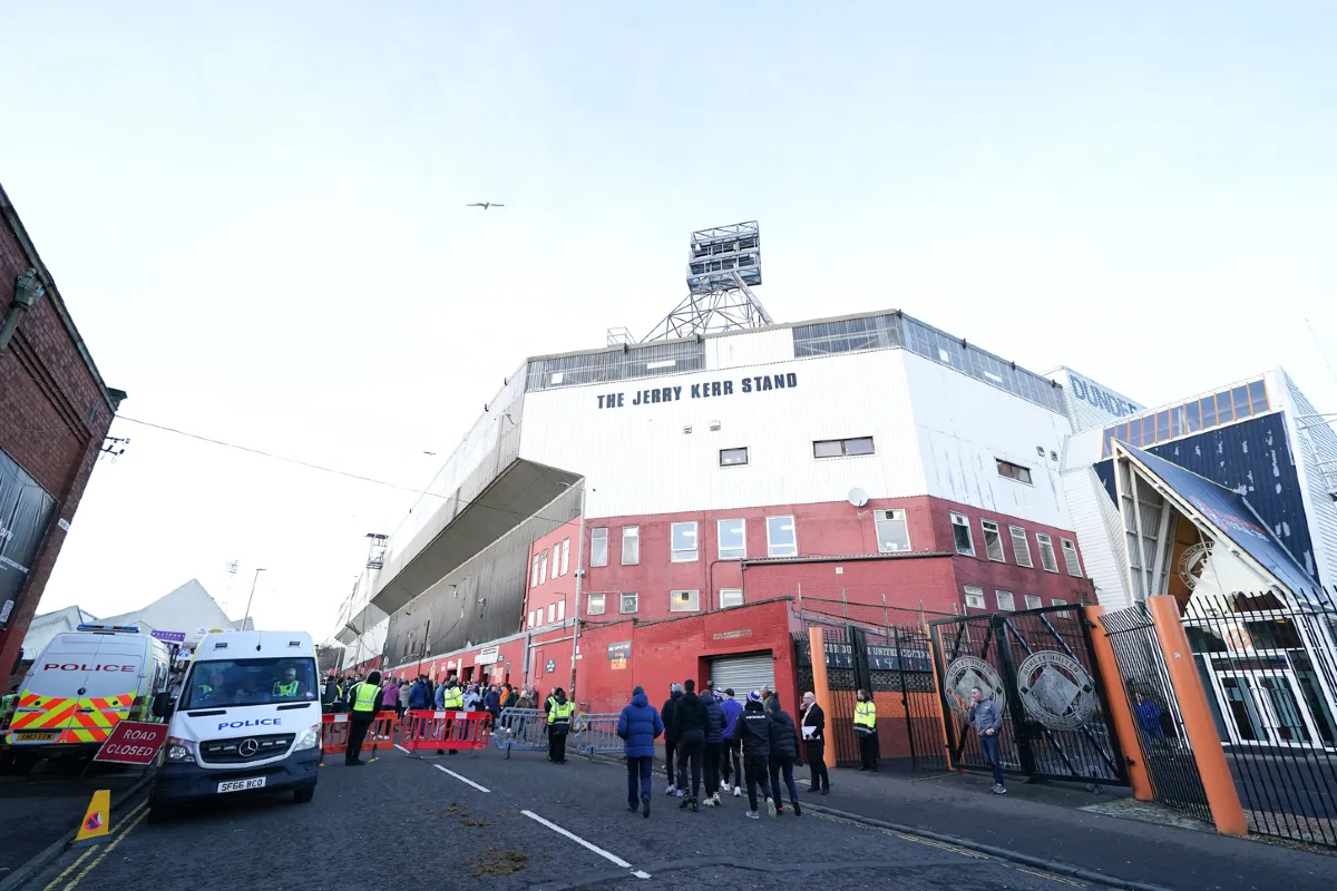 Dundee police investigation opened after goalkeeper struck by missile in derby