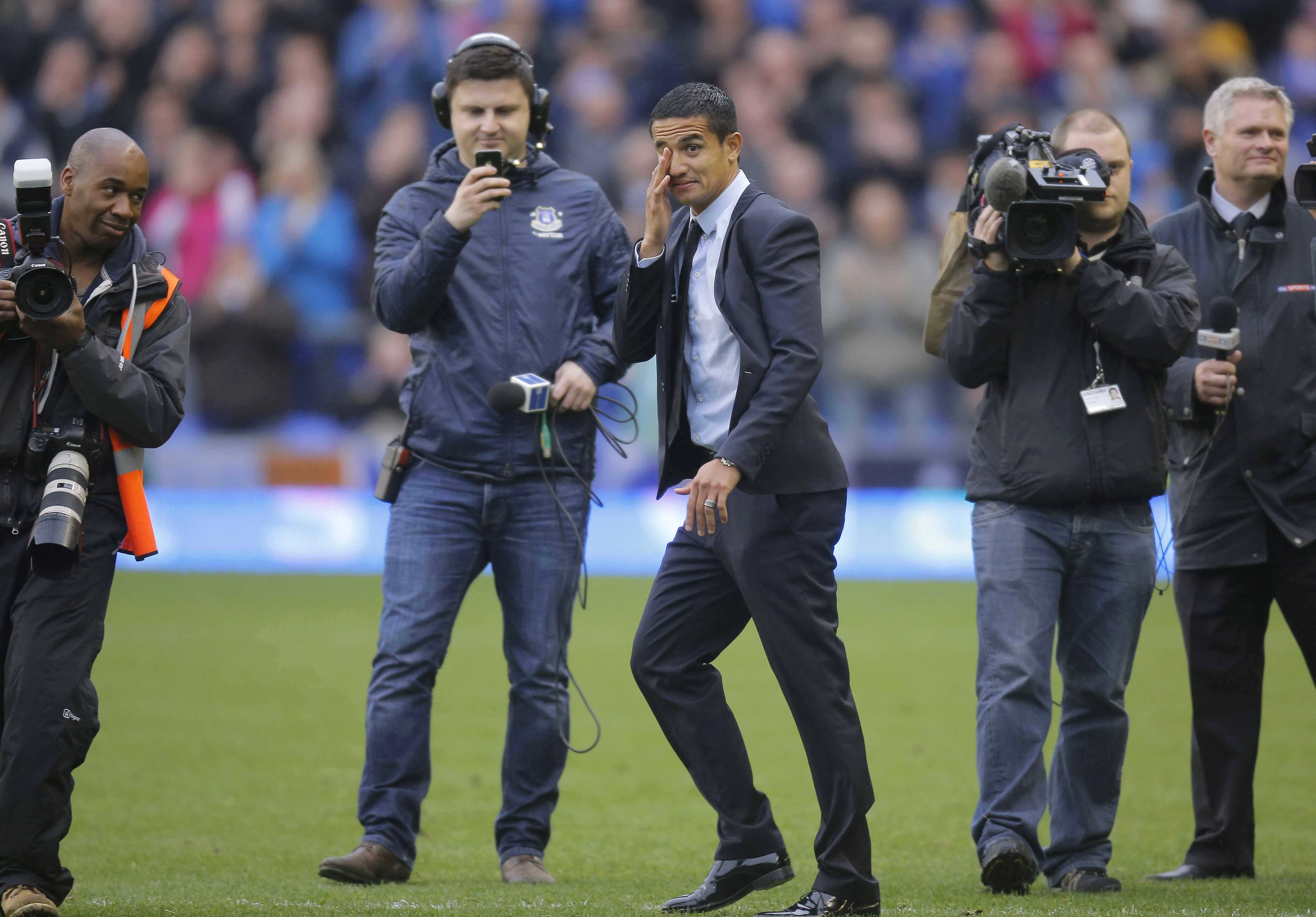An emotional Tim Cahill is welcomed back by Everton fans at Goodison Park in 2013