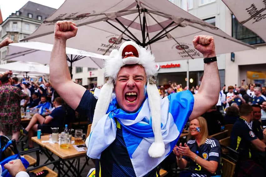 Obscene gesture from Scotland fan on live TV
