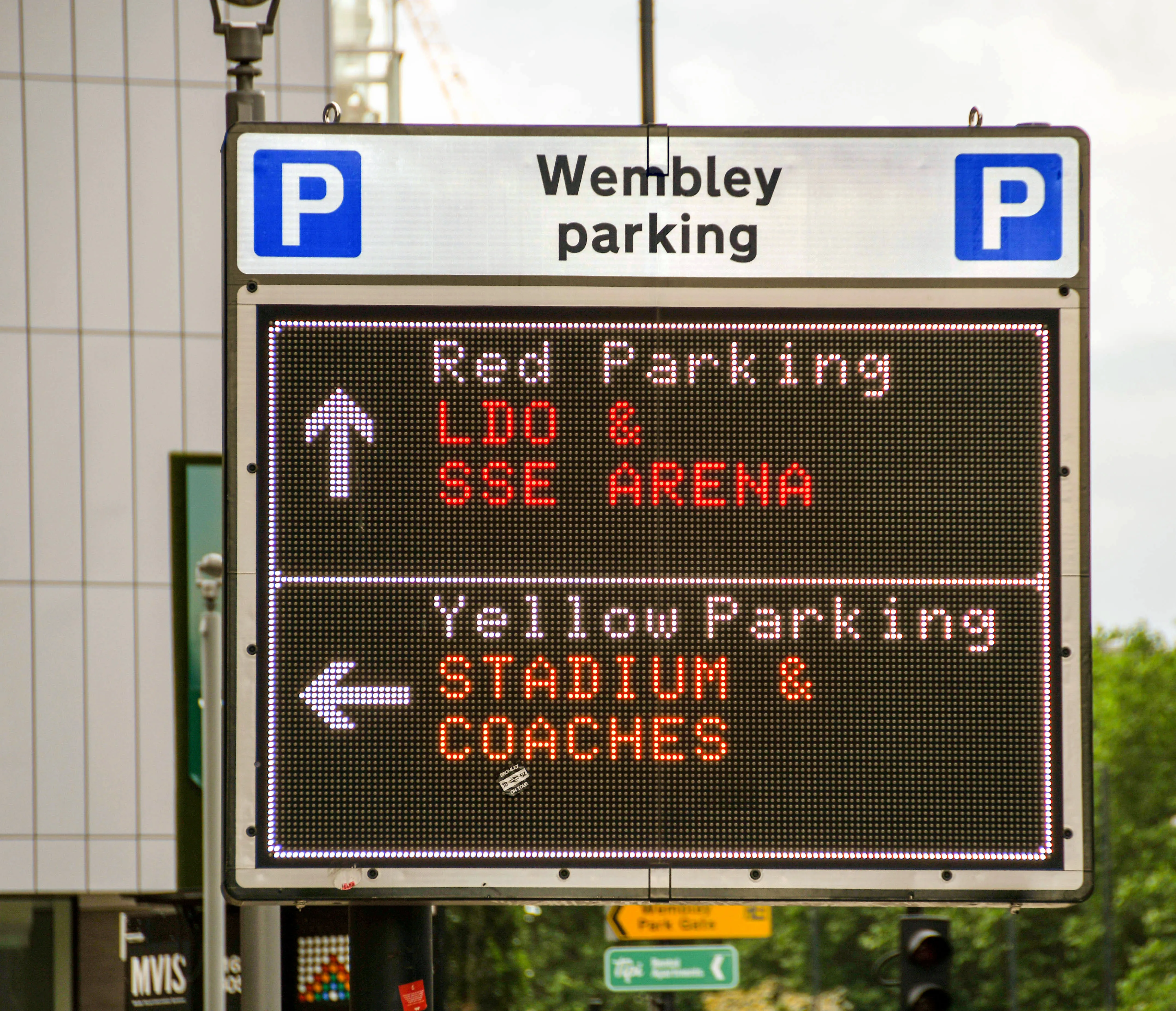 Close up of an electronic display with vehicle parking information for Wembley Stadium