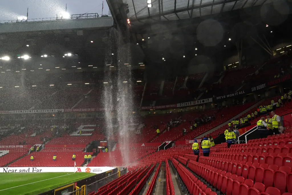 A general view of the roof of the stadium leaking following the Premier League match at Old Trafford, Manchester.