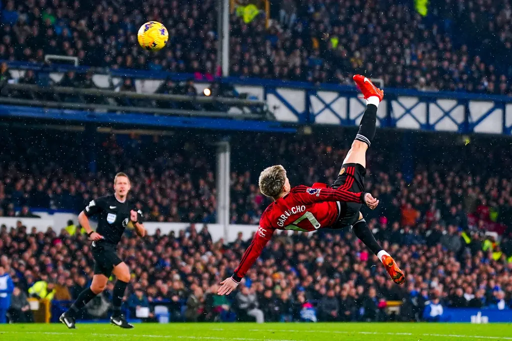 Alejandro Garnacho scores an overhead kick for Manchester United at Everton's Goodison Park, designed by Archibald Leitch