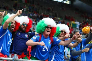 Italy fans join traditional Albanian dance circle in Germany