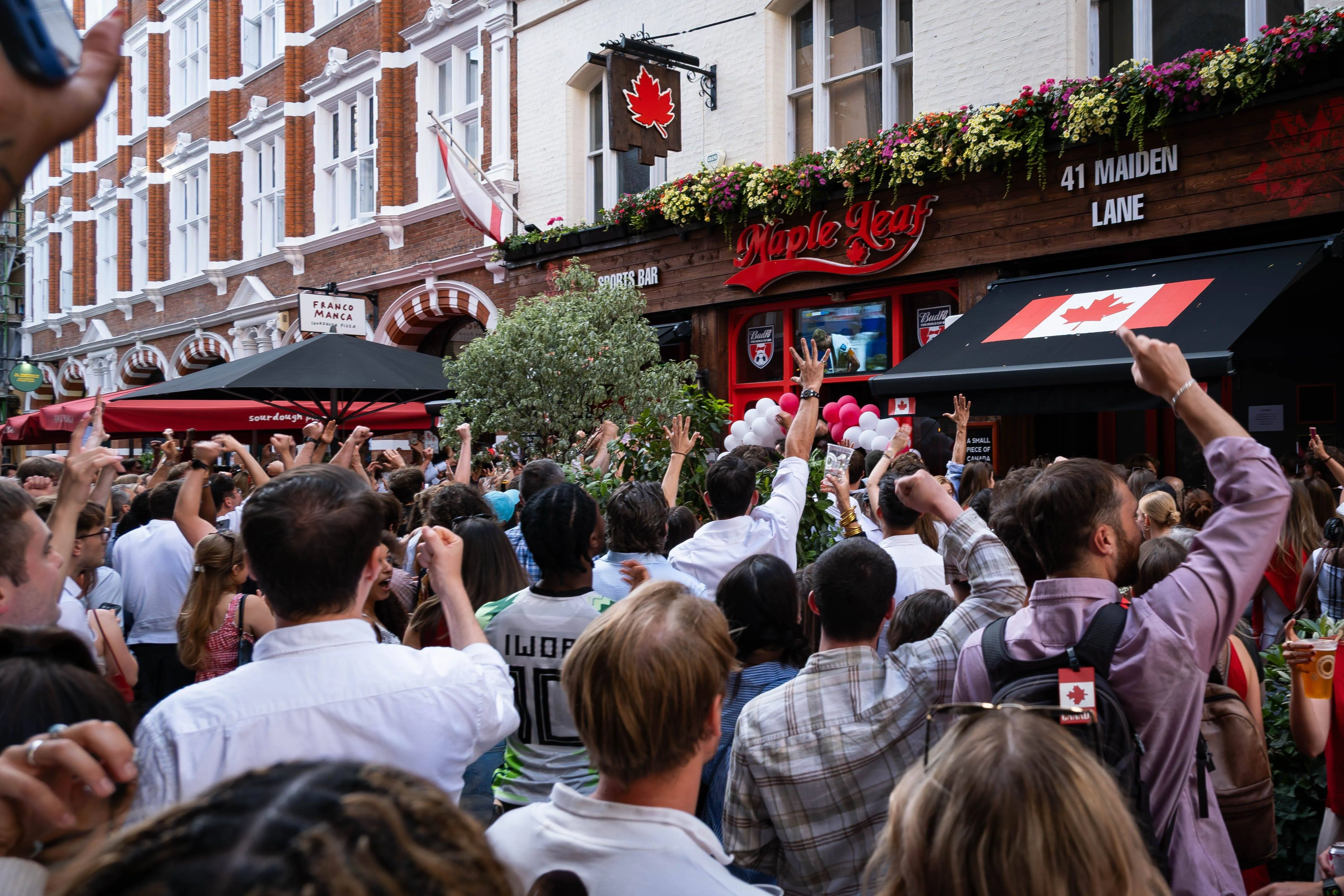 A crowd gathers outside a London pub to watch the 2026 World Cup