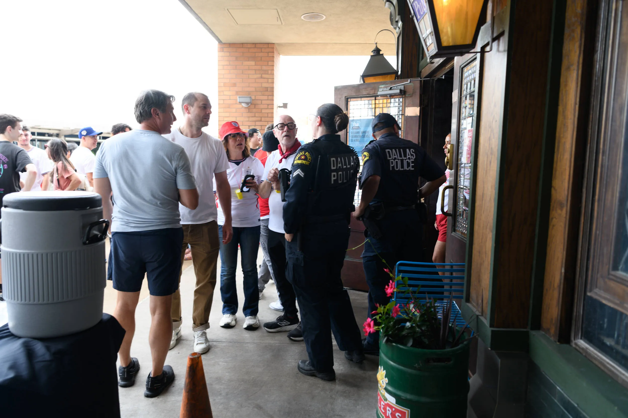 Dallas Police and England fans outside a Texas bar 